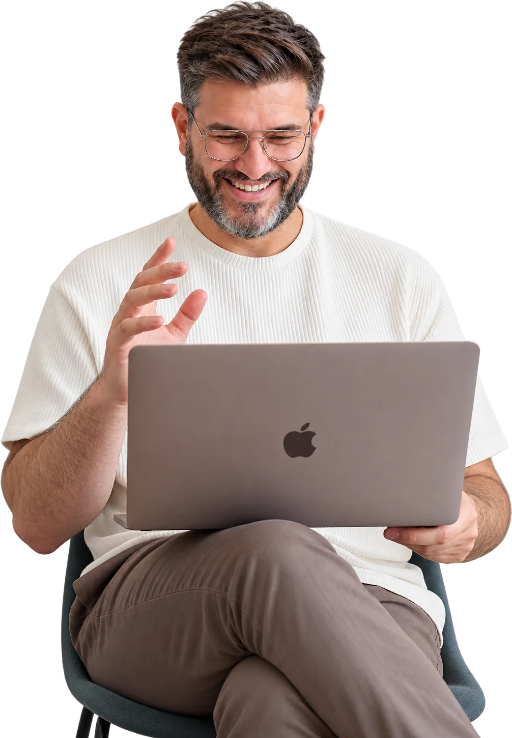 Smiling man in glasses using a laptop on his lap